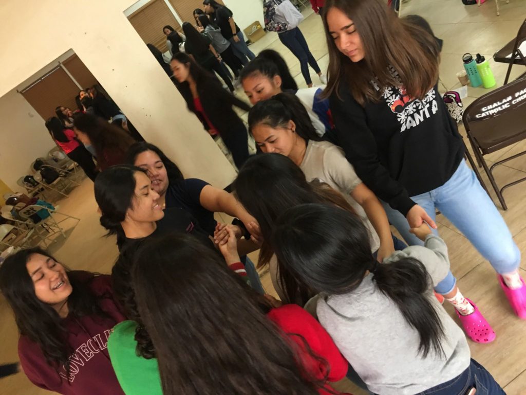 Seniors playing an icebreaker during the retreat