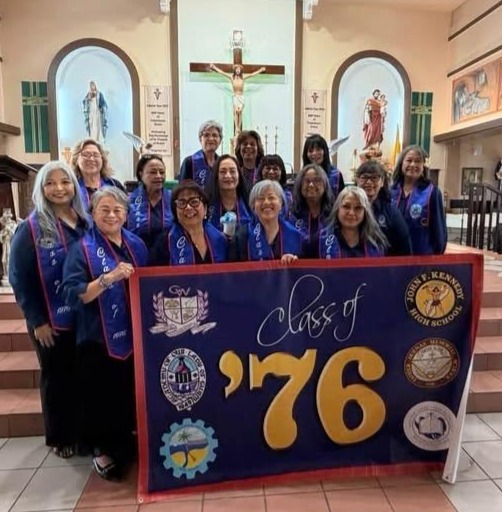 On July 2, 2026, the Guam high schools’ classes of 1976 had an islandwide Mass celebration at Saint Francis Yona Church. Fr. Felix Leon Guerrero, a member from the Father Duenas Memorial High School Class of 1976, was the celebrant. The AOLG Class of 1976 joined in the celebration. The logos for each school banner represented at the islandwide Mass are illustrated on the banner held by the AOLG alumnae present.